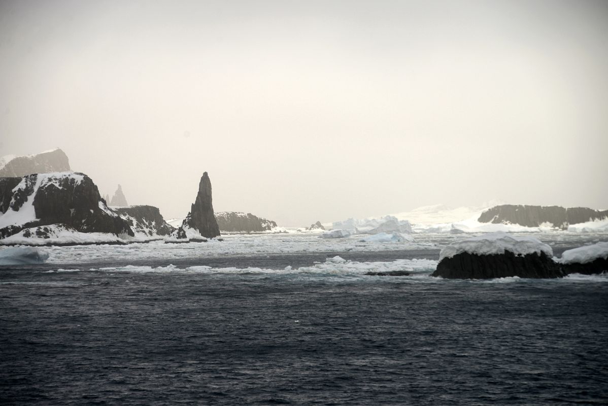 19C Passing By Jagged Aitcho Islands Part Of South Shetland Islands With Drift Ice From Quark Expeditions Cruise Ship In Antarctica